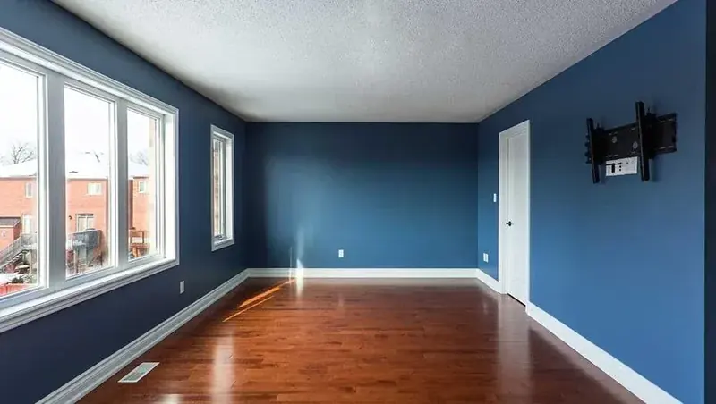 Blue living room after painting
