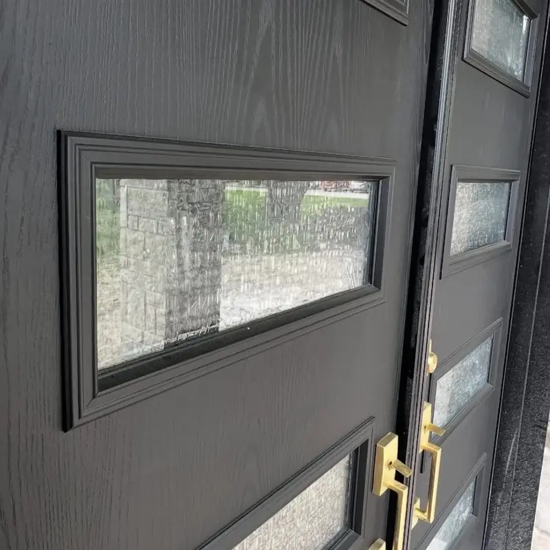 Front door refinished in black after painting